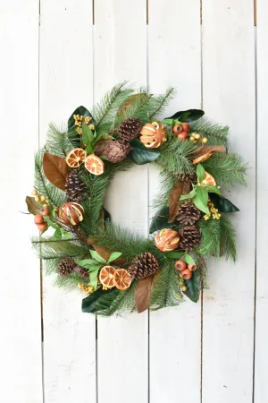 24" Faux Mixed Pine, Magnolia, Orange, and Berry Wreath