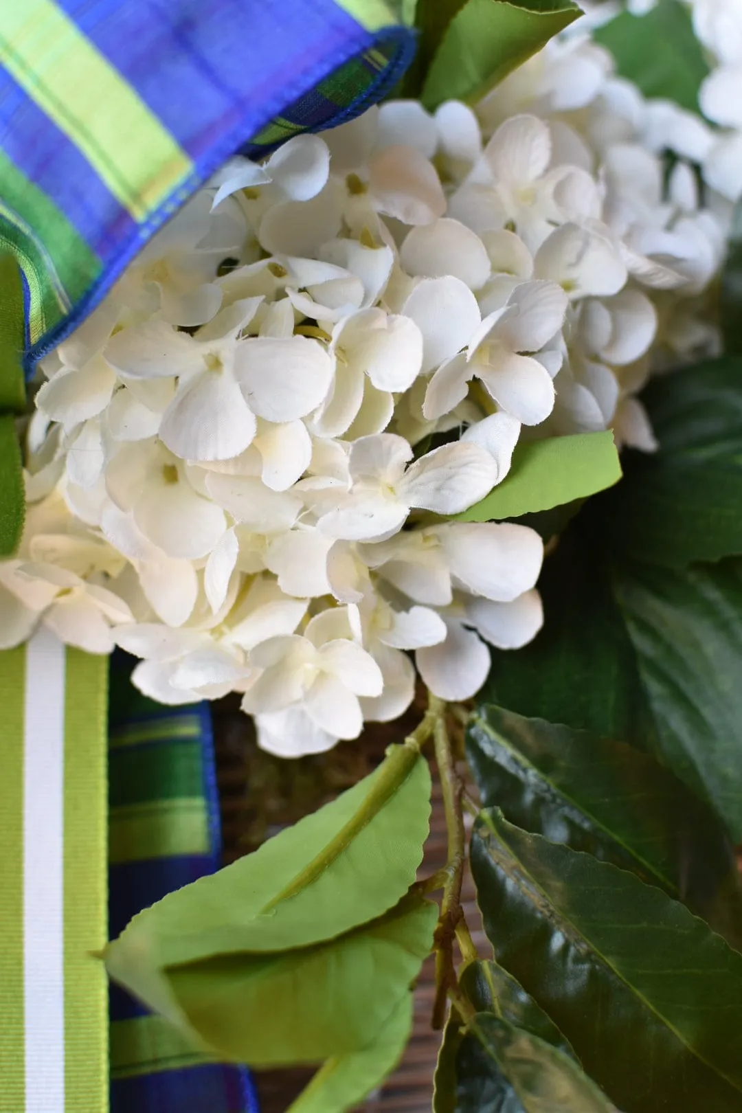 White   Green Laurel and Hydrangea Basket Blue/Green Bow